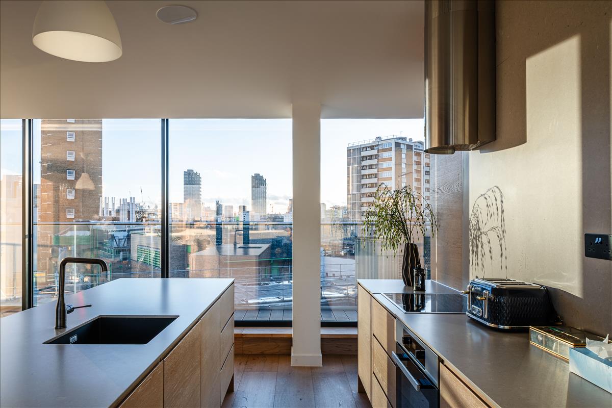 This stunning seventh-floor penthouse sits atop a beautiful Edwardian building, offering nearly 1,700 square feet of luxurious living space with three bedrooms, three bathrooms, and breathtaking panoramic city views. Combining historical charm with modern elegance, this home is a rare find in the heart of London.