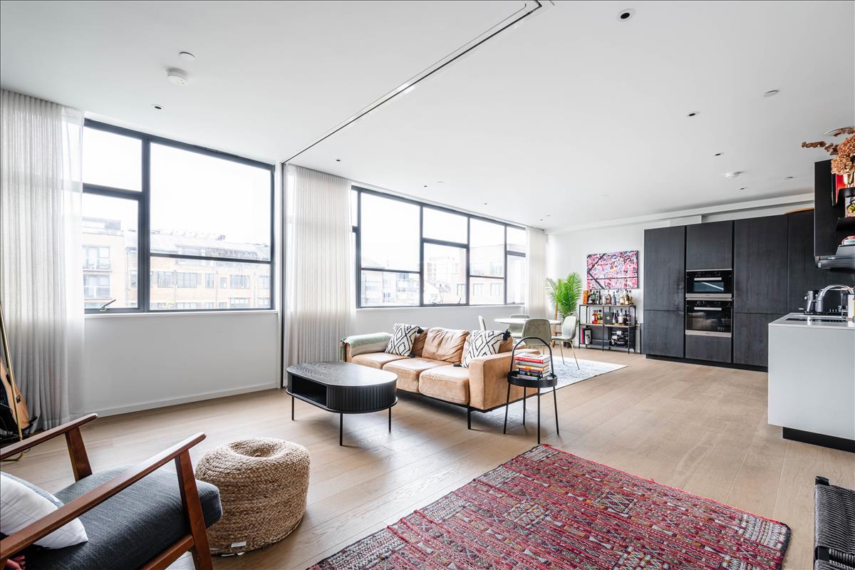 This beautifully presented bright and spacious three-bedroom apartment is on the third floor of the sought-after Long & Waterson development just moments from Columbia Road and Shoreditch High Street.
