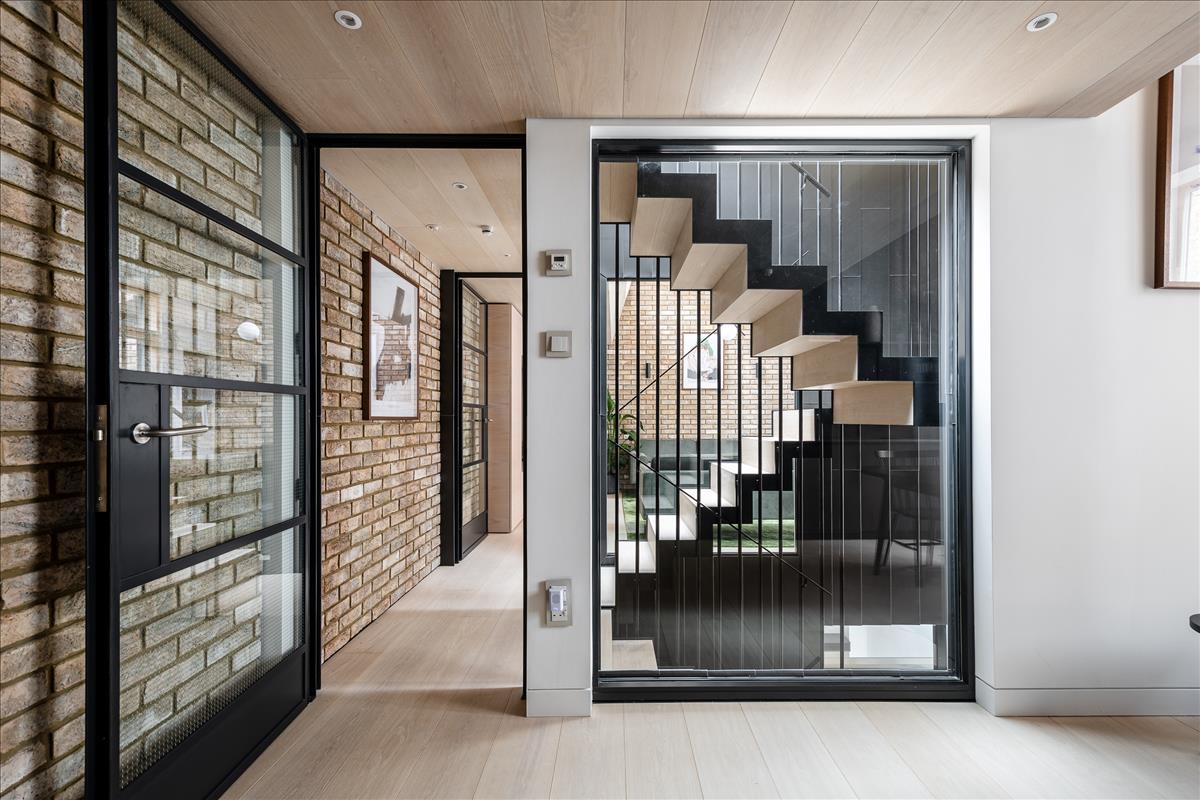 Three bed mews house development with architecturally designed interiors for rent e2