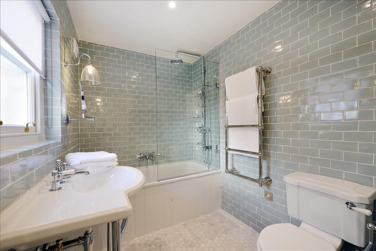 architecturally designed two bedroom, two bathroom split level apartment with courtyard garden on historic Columbia Road