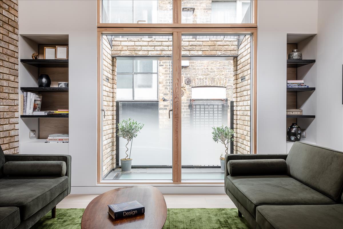 Three bed mews house development with architecturally designed interiors for rent e2