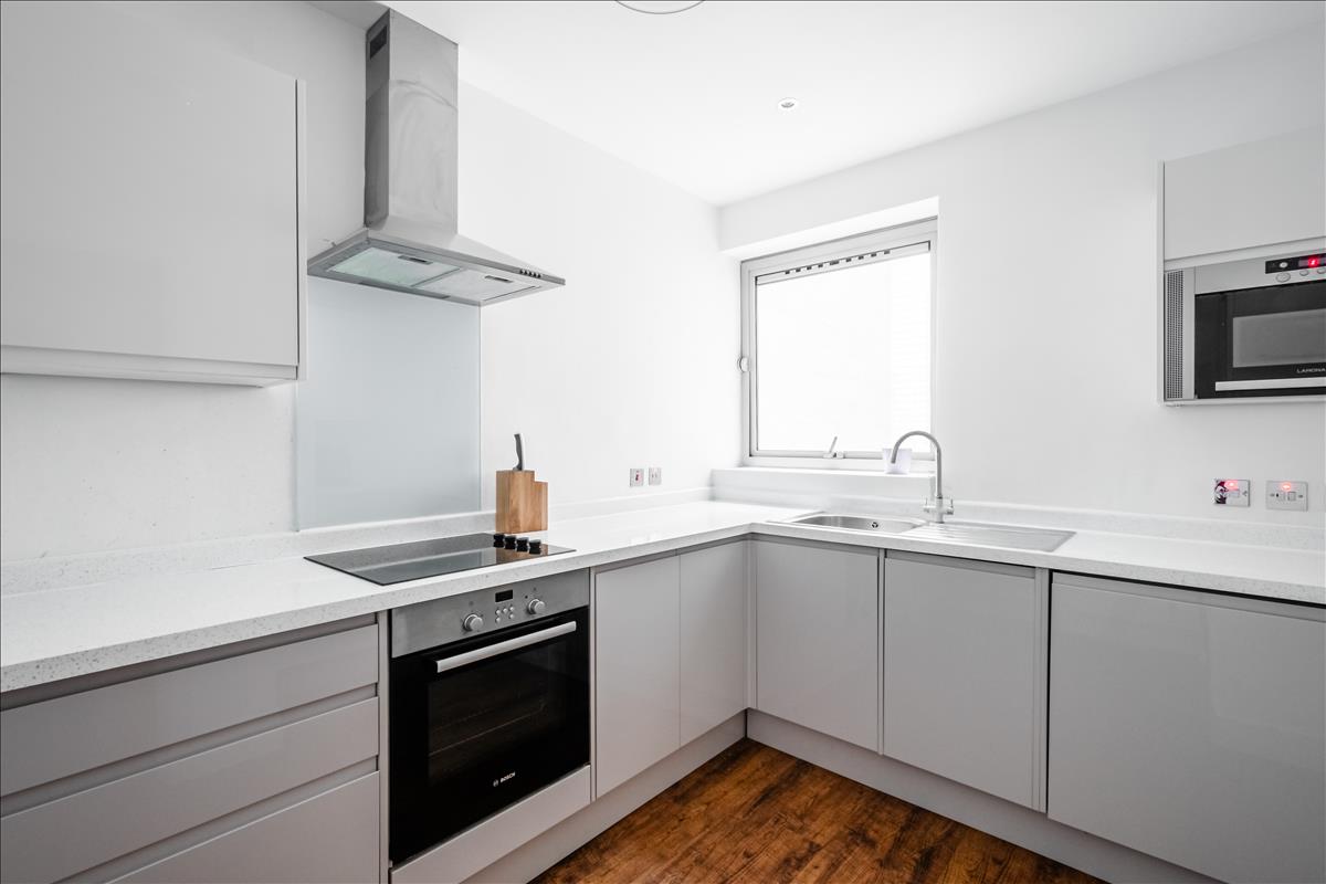 Kitchen - An exceptional three-bedroom, two-bathroom split-level apartment, ideally situated in the heart of London’s renowned jewellery quarter, Hatton Garden.