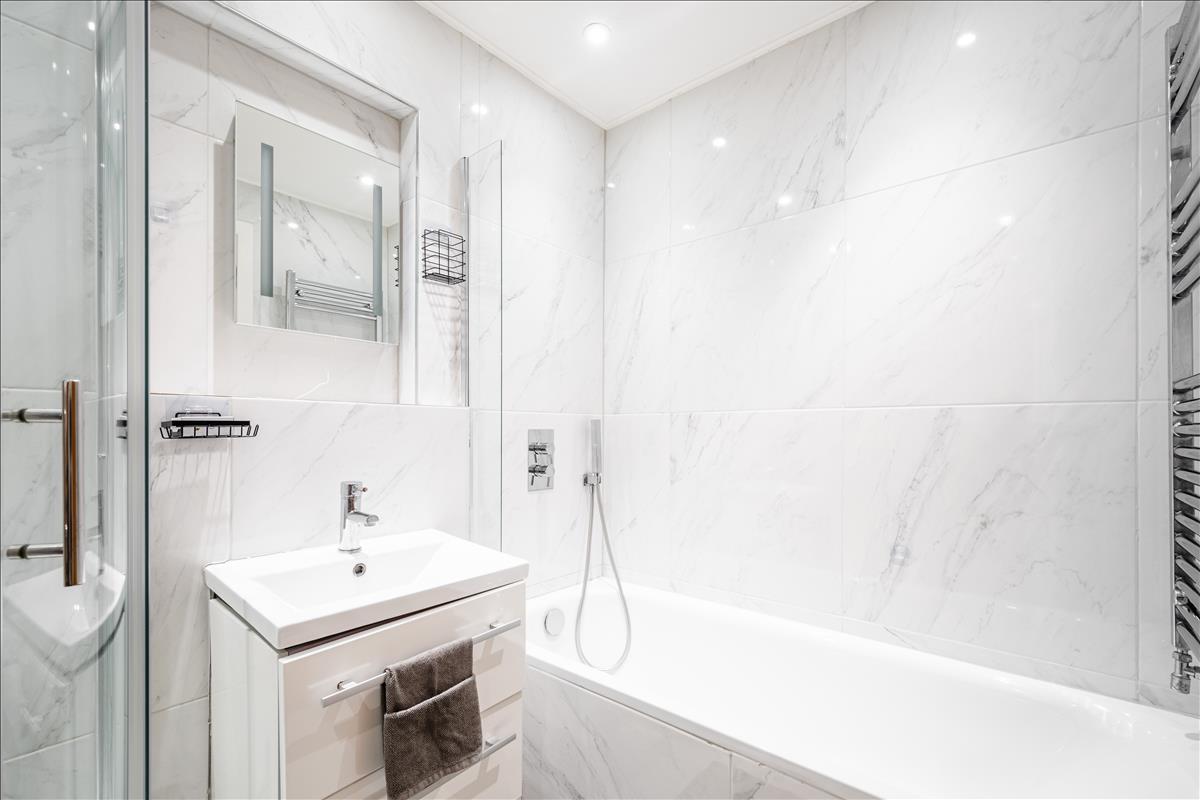 Bathroom - An exceptional three-bedroom, two-bathroom split-level apartment, ideally situated in the heart of London’s renowned jewellery quarter, Hatton Garden.
