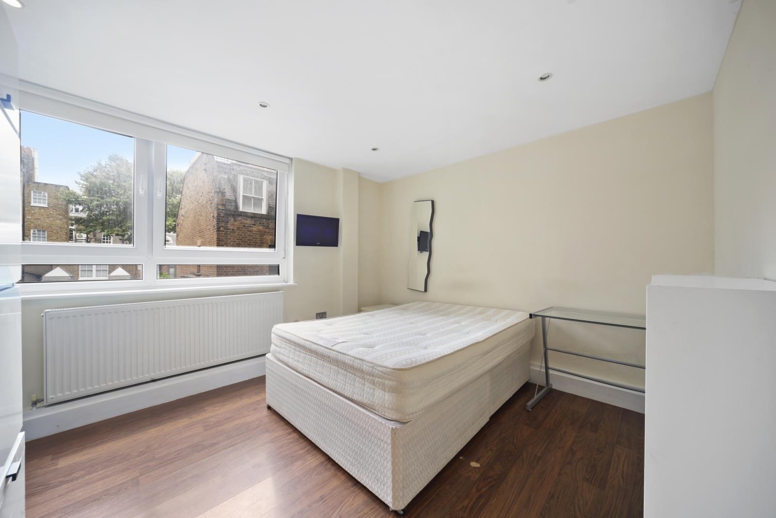 Bedroom. Flat for sale Guilford Street, Camden, London, WC1N. Three bedrooms, two bathrooms. 