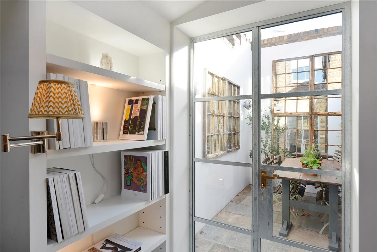 architecturally designed two bedroom, two bathroom split level apartment with courtyard garden on historic Columbia Road