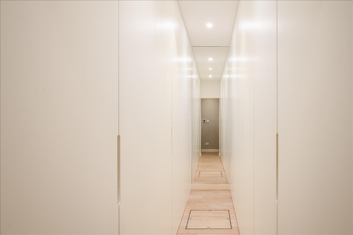 Walk-in wardrobe. Three bedroom split-level duplex apartment for sale on Orde 
