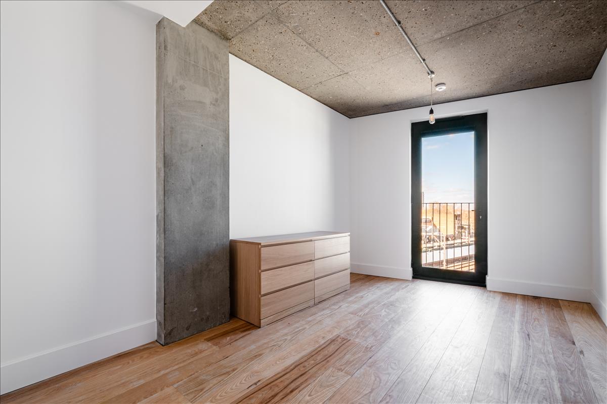 Bedroon - A stunning three-bedroom, two-bathroom split-level “sky house” apartment set across the fifth and sixth floors in the heart of London Fields.