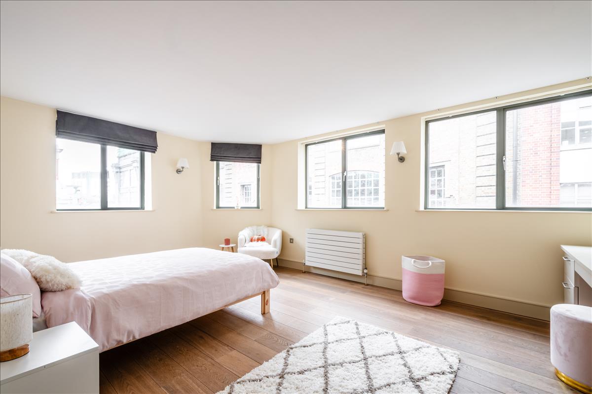 Split-level penthouse for sale, Boundary Street, Shoreditch, E2. Principal bedroom wide angle