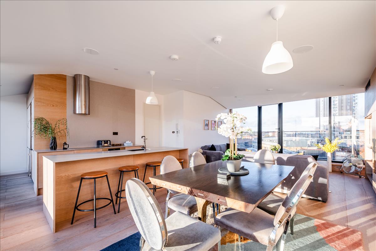 This stunning seventh-floor penthouse sits atop a beautiful Edwardian building, offering nearly 1,700 square feet of luxurious living space with three bedrooms, three bathrooms, and breathtaking panoramic city views. Combining historical charm with modern elegance, this home is a rare find in the heart of London.