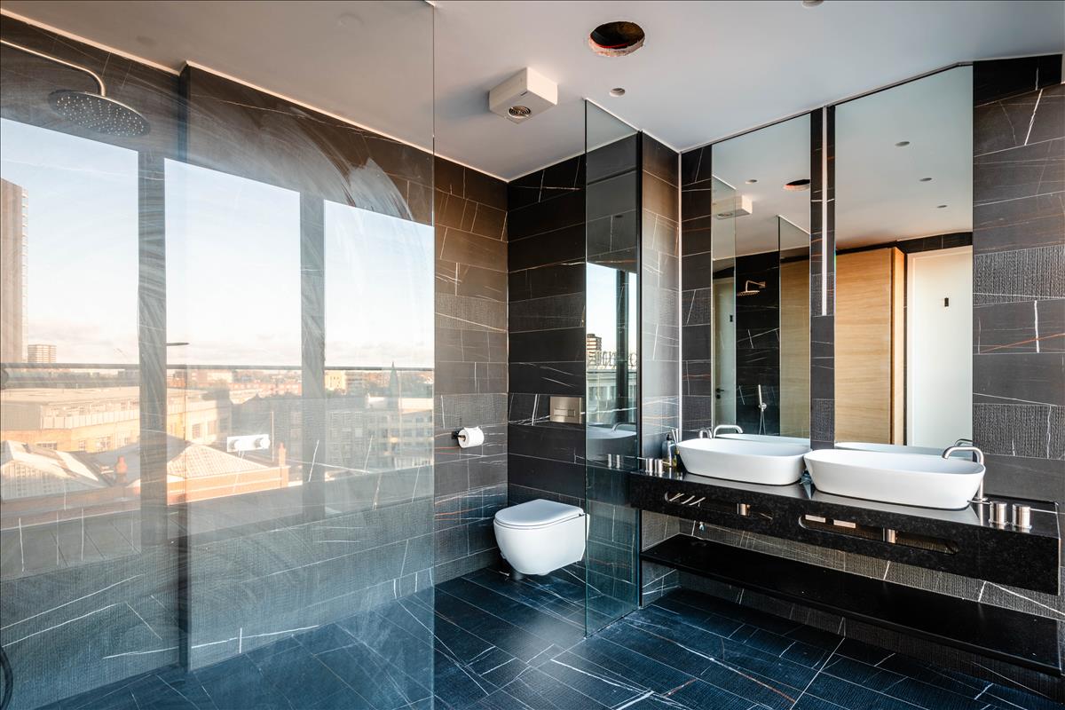 This stunning seventh-floor penthouse sits atop a beautiful Edwardian building, offering nearly 1,700 square feet of luxurious living space with three bedrooms, three bathrooms, and breathtaking panoramic city views. Combining historical charm with modern elegance, this home is a rare find in the heart of London.