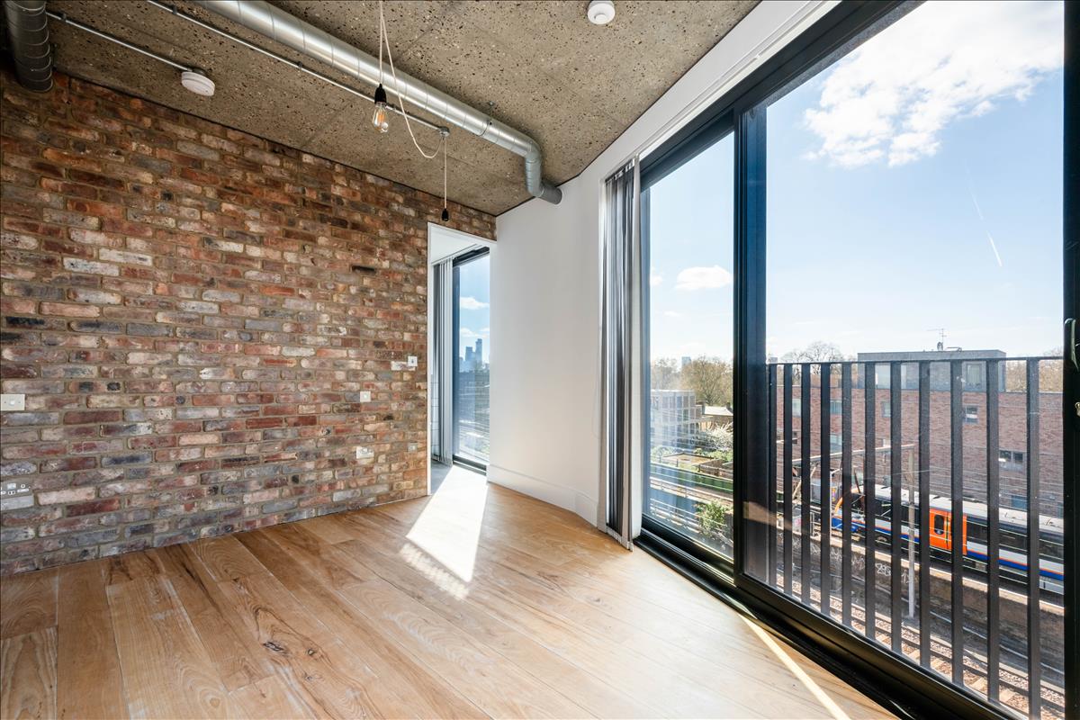 Bedroon - A stunning three-bedroom, two-bathroom split-level “sky house” apartment set across the fifth and sixth floors in the heart of London Fields.