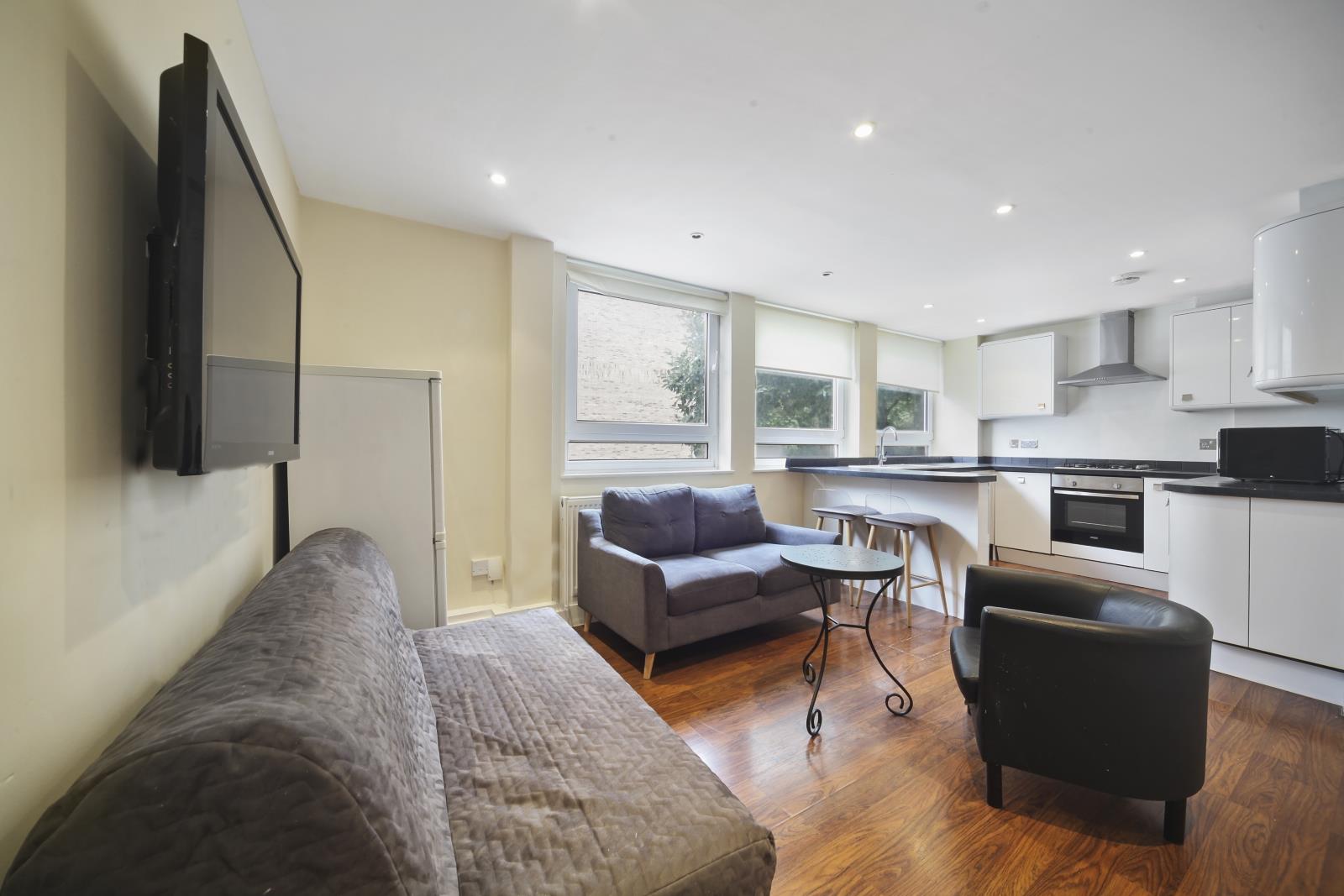 Living room. Flat for sale Guilford Street, Camden, London, WC1N. Three bedrooms, two bathrooms. 