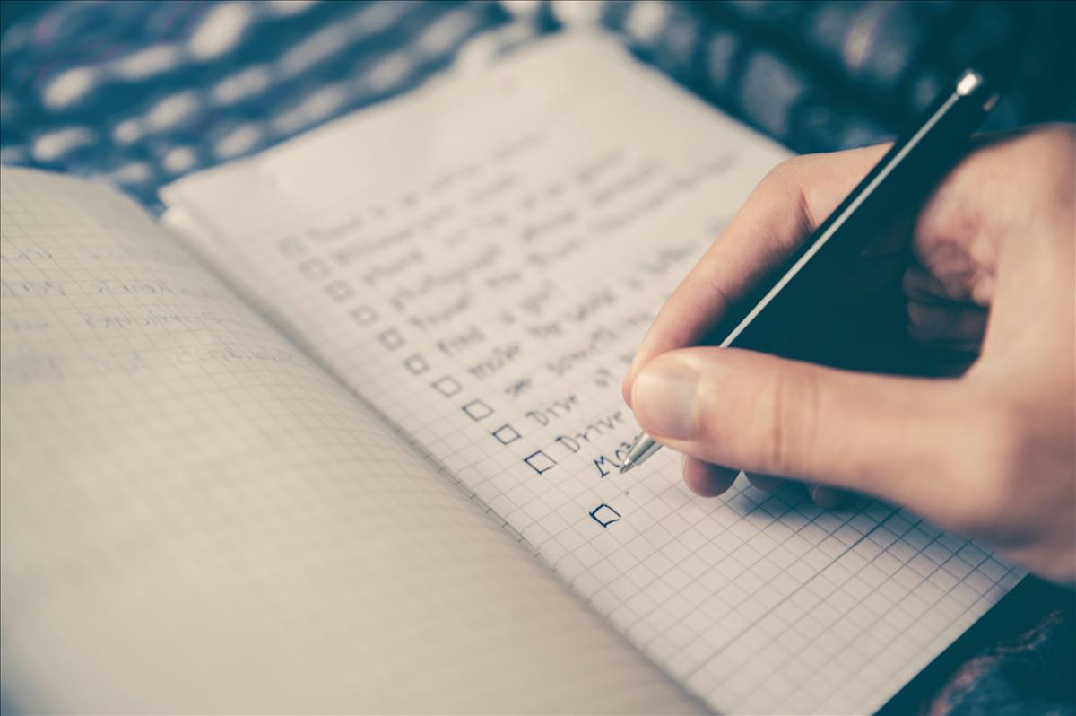 Writing in notebook