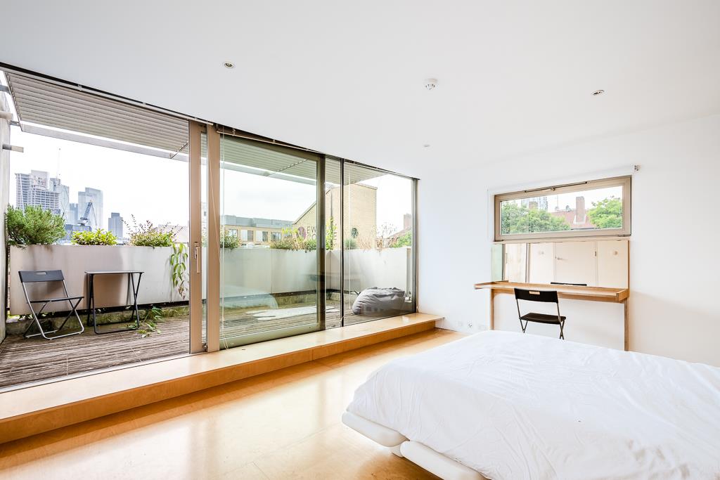 Modern bright architecturally designed house Shoreditch balcony light big window