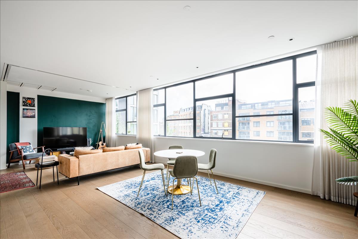 This beautifully presented bright and spacious three-bedroom apartment is on the third floor of the sought-after Long & Waterson development just moments from Columbia Road and Shoreditch High Street.