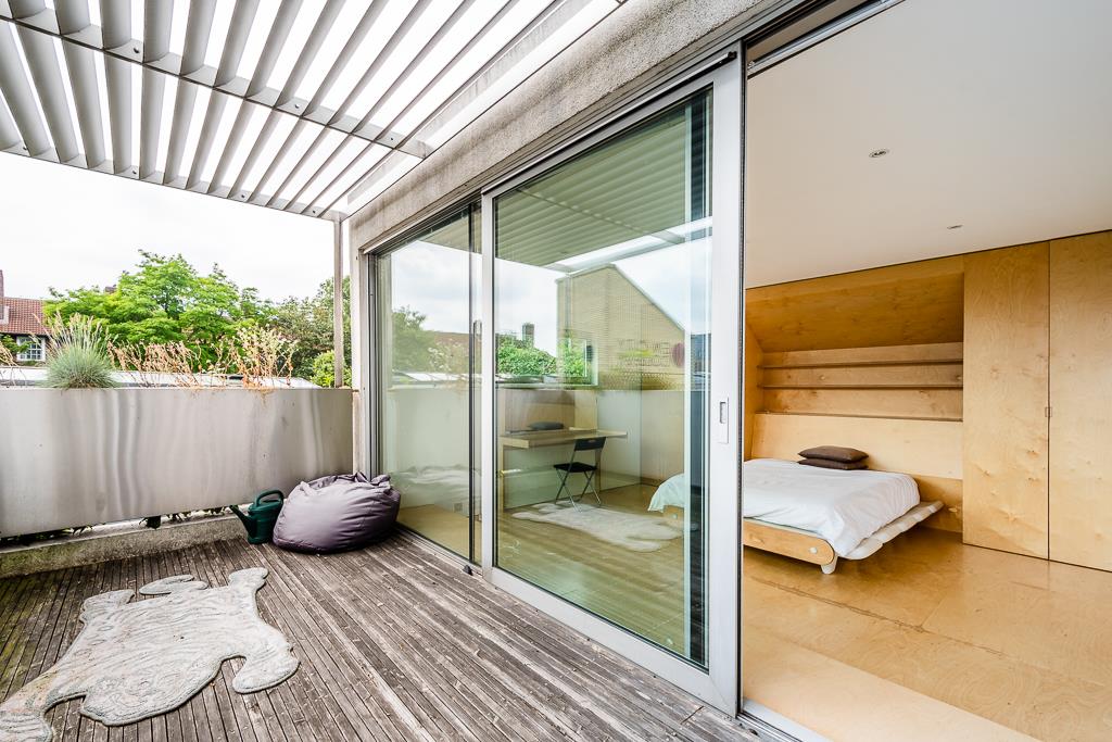Modern bright architecturally designed house Shoreditch deck balcony sliding door