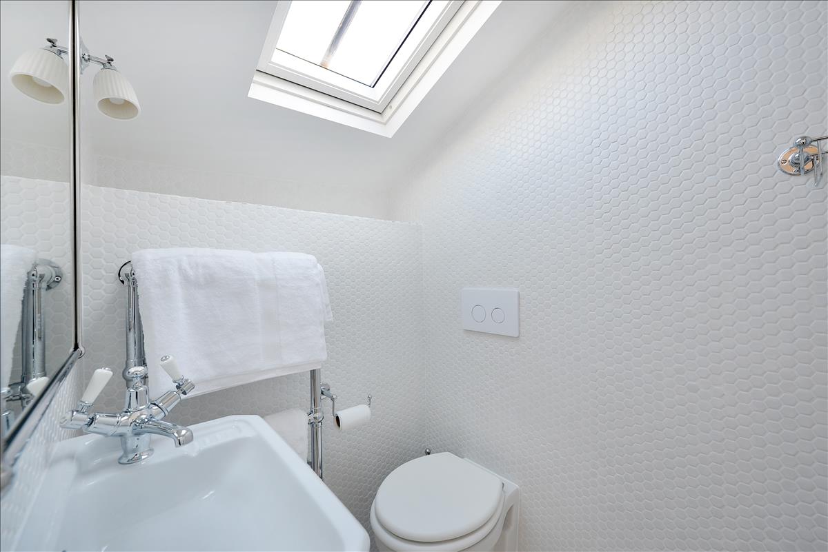 architecturally designed two bedroom, two bathroom split level apartment with courtyard garden on historic Columbia Road