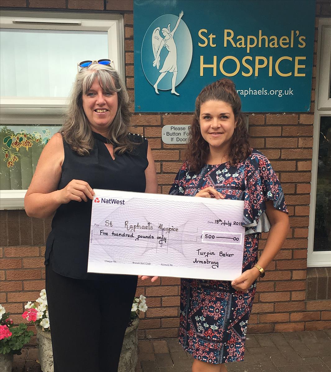 tba cheque donation to st raphs 