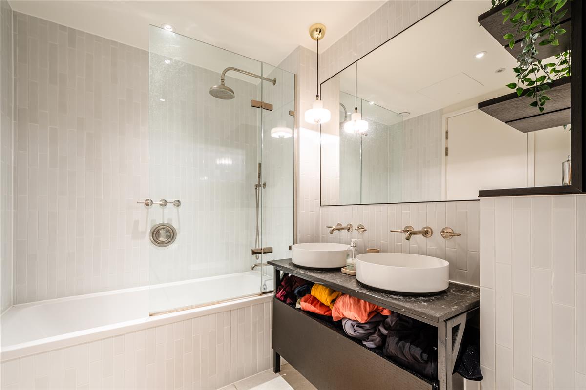 This beautifully presented bright and spacious three-bedroom apartment is on the third floor of the sought-after Long & Waterson development just moments from Columbia Road and Shoreditch High Street.