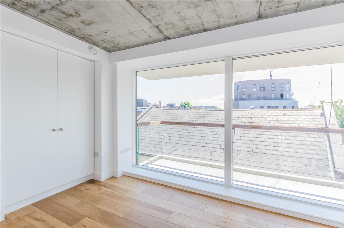 New build apartment London Fields bedroom balcony built in wardrobe