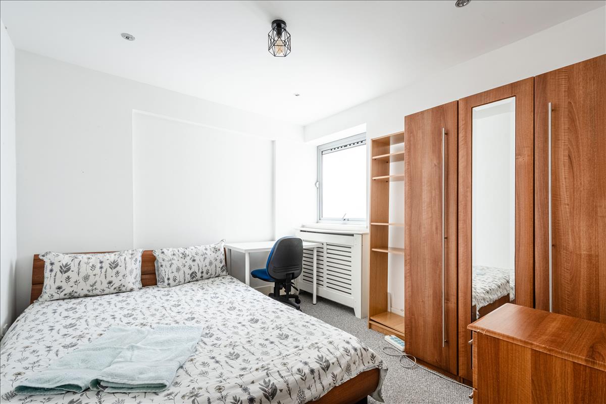 Bedroom - An exceptional three-bedroom, two-bathroom split-level apartment, ideally situated in the heart of London’s renowned jewellery quarter, Hatton Garden.