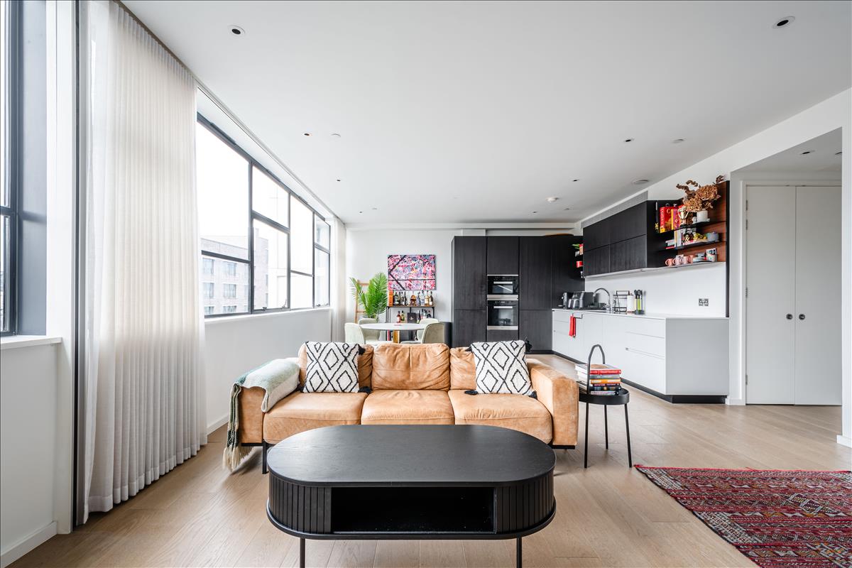This beautifully presented bright and spacious three-bedroom apartment is on the third floor of the sought-after Long & Waterson development just moments from Columbia Road and Shoreditch High Street.