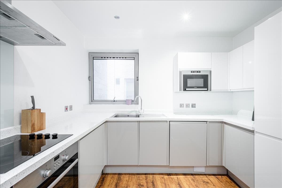 Kitchen - An exceptional three-bedroom, two-bathroom split-level apartment, ideally situated in the heart of London’s renowned jewellery quarter, Hatton Garden.