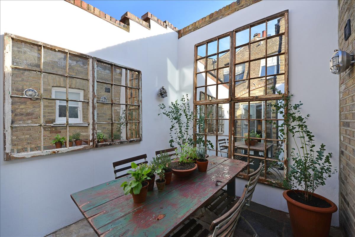 architecturally designed two bedroom, two bathroom split level apartment with courtyard garden on historic Columbia Road
