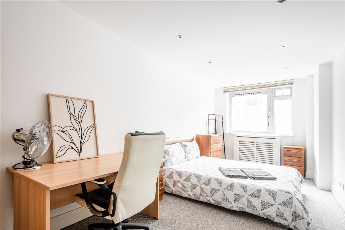 Bedroom - An exceptional three-bedroom, two-bathroom split-level apartment, ideally situated in the heart of London’s renowned jewellery quarter, Hatton Garden.
